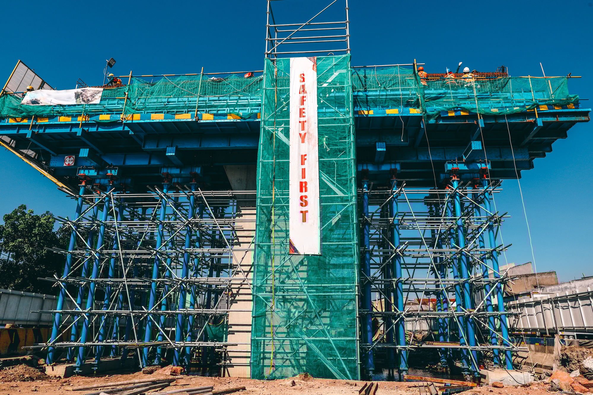 Safety first poster on construction site